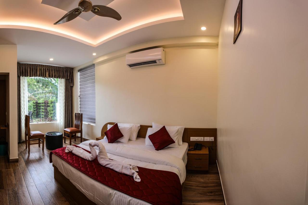 Thenmala Hormuz Inn Kolattupuzha Exterior foto